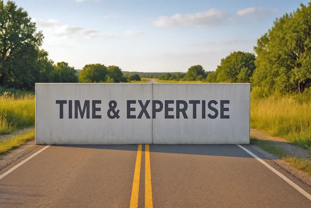 Concrete wall labeled ‘Time & Expertise’ blocking a road, with a clear path visible beyond it.
